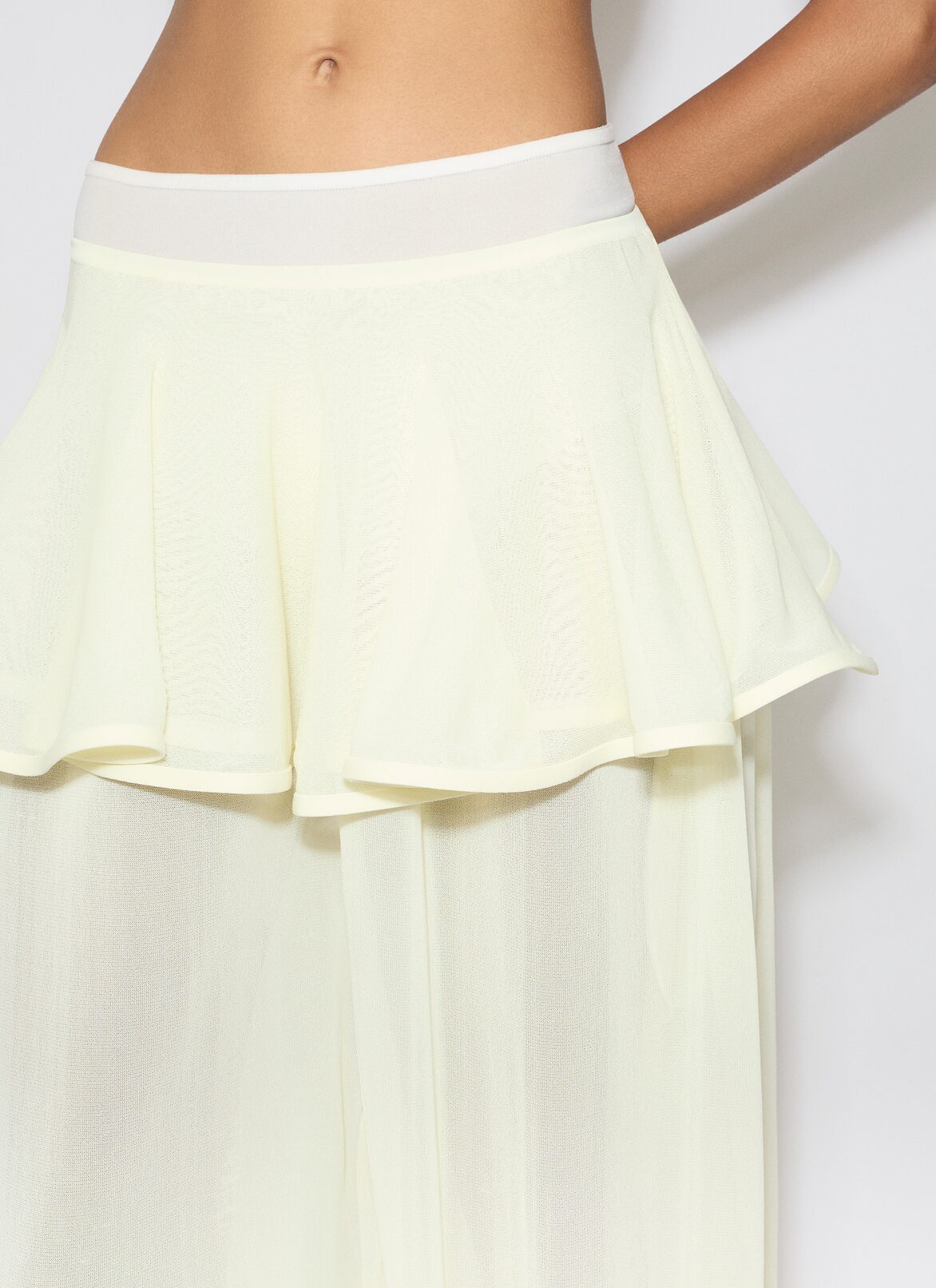 KNIT PEPLUM PANTS ALAÏA YELLOW KNIT PEPLUM PANTS